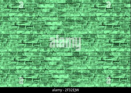 Tinted old brick wall as background.. Abstract green grunge background. Green vintage banner. Copy space. Stock Photo