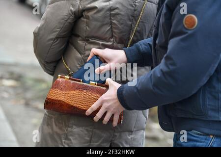 Pickpocket, senior citizen, mugging Stock Photo