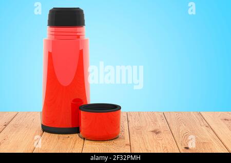 Vacuum flask, thermos on the wooden planks, 3D rendering Stock Photo