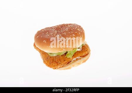 Burger King Chicken Jr Sandwich in Roll isolated on white background Stock Photo