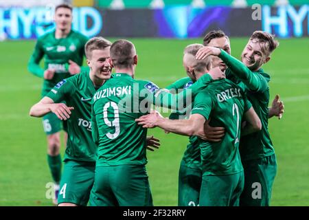 Warsaw, Poland. 13th Mar, 2021. Robert Ivanow, Mateusz Kuzimski, Jan Grzesik, Mateusz Kupczak and Maciej Zurawski of Warta celebrate a goal during the Polish PKO Ekstraklasa League match between Legia Warszawa and Warta Poznan at Marshal Jozef Pilsudski Legia Warsaw Municipal Stadium.(Final score; Legia Warszawa 3:2 Warta Poznan) (Photo by Mikolaj Barbanell/SOPA Images/Sipa USA) Credit: Sipa USA/Alamy Live News Stock Photo