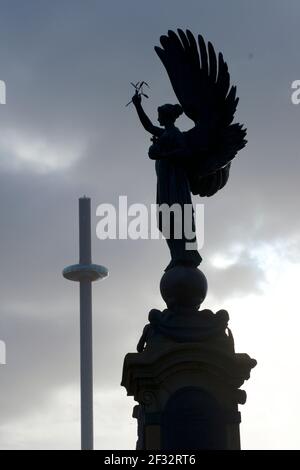 The Peace Statue of 1912 on the Brighton Hove boundary. Brighton and Hove, England. The i360 tower in the background. Stock Photo