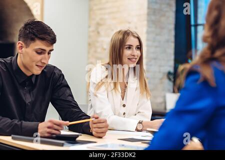 Business people working at table in office Stock Photo