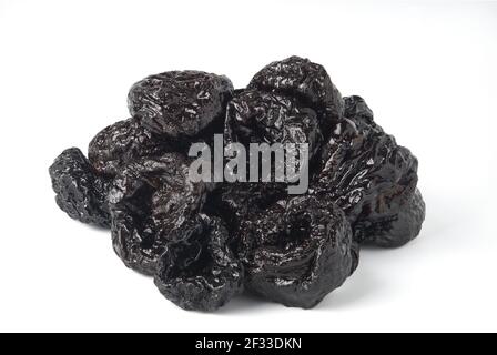Dried prunes isolated on white background Stock Photo