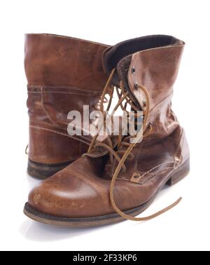 old leather travel vintage boots shoes isolated on white background Stock Photo