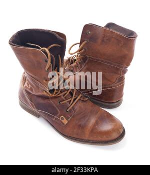old leather travel vintage boots shoes isolated on white background Stock Photo