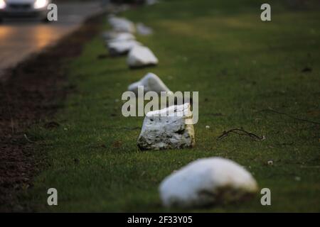 Stones along a road in sunset lighting, Macro and Close up Stock Photo