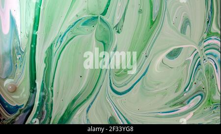 The colors of the aqueous ink are translucent. Abstract multicolored marble texture background Stock Photo