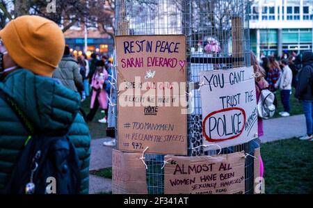 Brighton UK 13th March 2021 - Hundreds of people take part in a candlelit vigil for murder victim Sarah Everard in Brighton this evening . Reclaim These Streets protesters gathered in Brighton's Valley Gardens to take part in the vigil before police started to move them on after about half an hour:  Credit Simon Dack / Alamy Live News Stock Photo