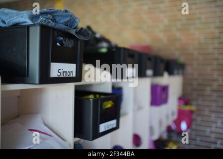 Individual coat racks for students in school Stock Photo