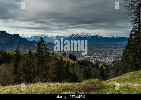 View from Dornbirn Fluh over the Rhine Valley to the Swiss mountains and the Säntis. dark rain clouds give an interesting mood. Gewitterstimmung sky Stock Photo