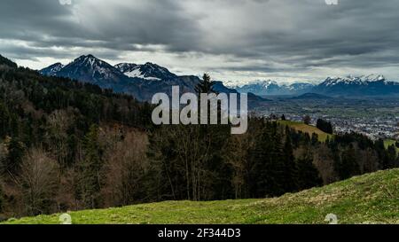 View from Dornbirn Fluh over the Rhine Valley to the Swiss mountains and the Säntis. dark rain clouds give an interesting mood. Gewitterstimmung sky Stock Photo