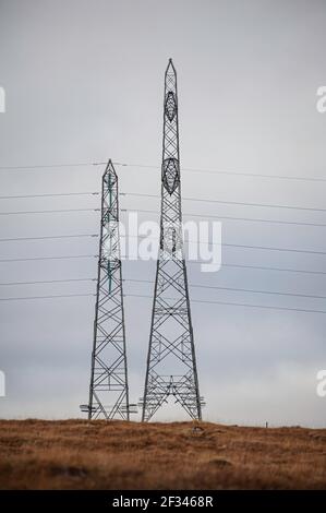 Mega Tall Pylons on the National Grid between Fort Augustus and Denny crosses the Coyrriarick Pass in the Highland Region. Stock Photo