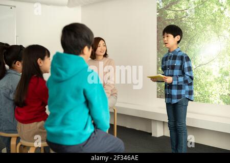 Child Giving Presentation Stock Photo - Alamy