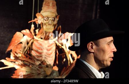 Professor Gunter von Hagens July 2002Professor Gunther von  Hagens with one of his new works entitled 'Mystical Plastinate' at the 'Body Worlds' exhibition at the Atlantis Gallery in Brick Lane. 12 July 2002 photo Andy Paradise Stock Photo