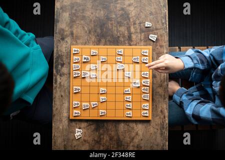 Elementary School Students as Shogi (Japanese Chess) Players Stock Photo