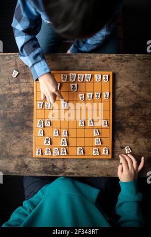 Elementary School Students as Shogi (Japanese Chess) Players Stock Photo