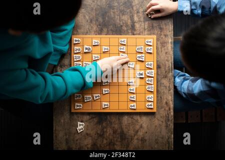 Elementary School Students as Shogi (Japanese Chess) Players Stock Photo