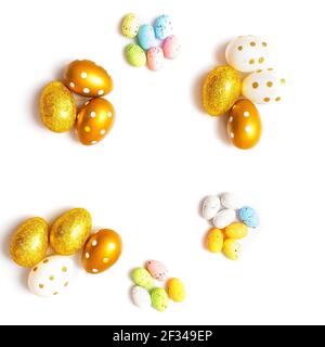 Easter Egg bottom border over a soft white banner background. Top down view with copy space. Stock Photo