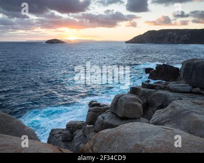 Southern Ocean sunset seen from Natural Bridge, Torndirrup National Park, Albany, Western Australia Stock Photo