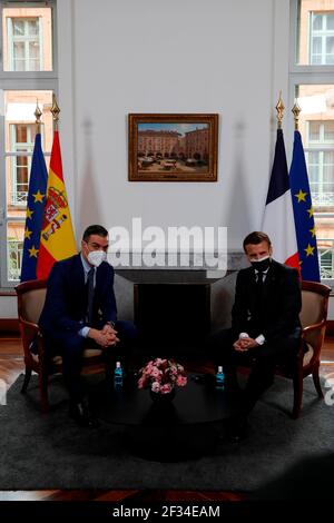 Montauban, France. 15th Mar, 2021. The French President, Emmanuel Macron, receives the Pedro Sanchez, Spanish Prime Minister, in the Prefecture of Tarn-et-Garonne, in the French town of Montauban, where the 26th bilateral summit between the two countries is taking place on Monday. After four years without bilateral summits, the head of the Spanish government and the French president are meeting to sign a dual nationality agreement, pay tribute to Spanish exiles and analyse the challenges facing the EU due to the pandemic Credit: Jack Abuin/ZUMA Wire/Alamy Live News Stock Photo