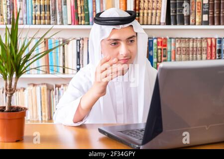 Aarabic muslim man using online technology Stock Photo