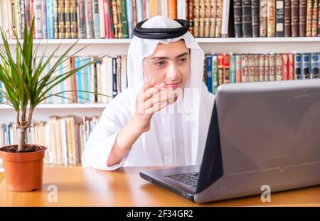 Aarabic muslim man using online technology Stock Photo