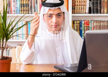Aarabic muslim man using online technology Stock Photo
