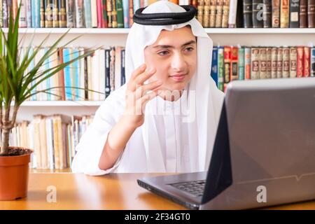 Aarabic muslim man using online technology Stock Photo
