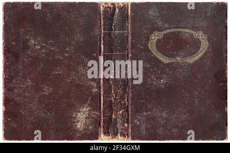 Old open book in crimson red textured worn paper cover - circa 1918 - with rounded golden decorative frame, isolated on white, perfect in detail! Stock Photo