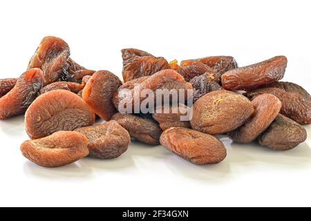 Dried apricots close up. Dried fruit isolated on white background. Stock Photo