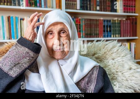 Arabic muslim man praying for god using rosary Stock Photo