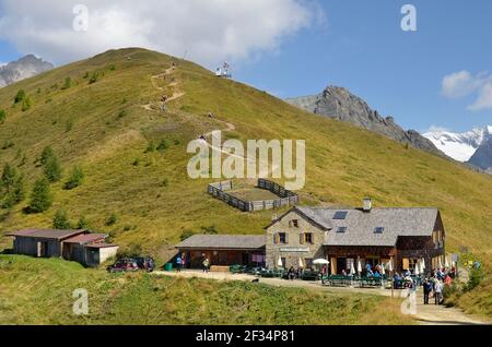 Matrei, Austria - September 05, 2018: Unidentified people and Kals-Matreier.Toerl inn on Goldried mountain in Austrian Alps Stock Photo