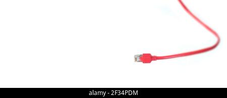 Red network plug and cable on white background,conectivity,online,networking concept,panoramic, large copy space Stock Photo