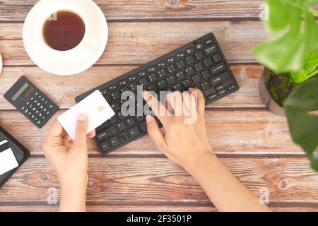 women hands typing on keyboard shopping online  Stock Photo