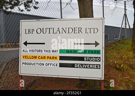 Sign at Wardpark Studio, Cumbernauld - LBP Outlander Ltd, arrows, directions to car park, visitor reception, production office, studio and deliveries Stock Photo