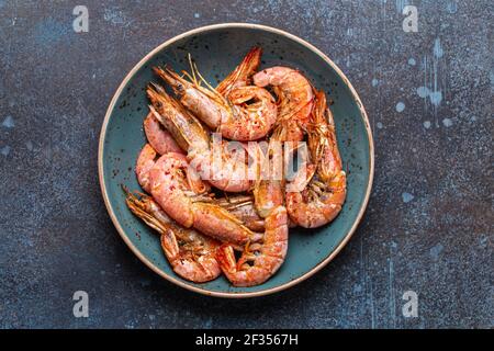 Whole cooked shrimps in bowl Stock Photo