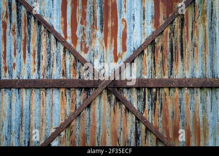 Rusty galvanized, corrugated iron siding, texture background Stock Photo