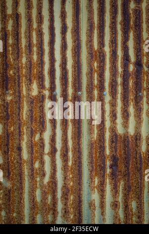 Rusty galvanized, corrugated iron siding, texture background Stock Photo