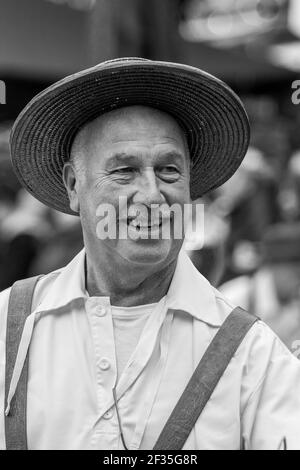 Cheese vendors in traditional costume at Alkmaar Cheese Market, Netherlands Stock Photo