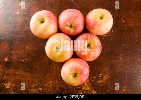 A top view of fresh apples forming a triangle Stock Photo