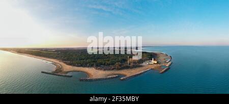 Bibione lighthouse from above at sunset in a panoramic view-Italy Stock Photo