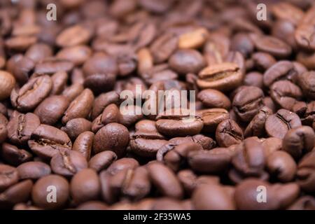 close up Freshly roasted coffee beans background. top view. Stock Photo