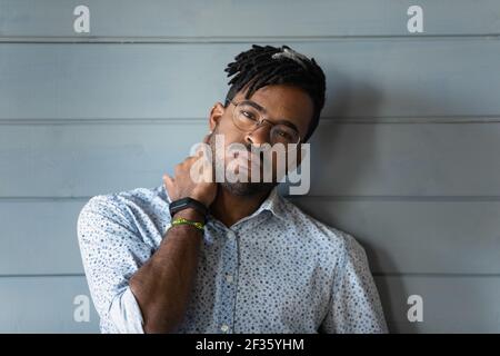 Headshot portrait of handsome bearded young man of african ethnicity Stock Photo
