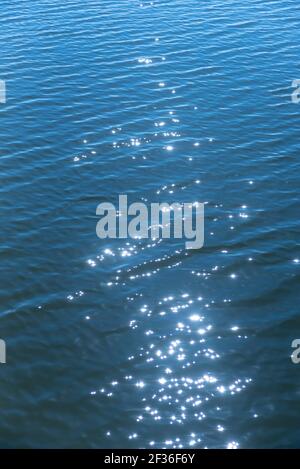 Sun Sparkling on Water Stock Photo