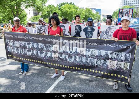 Washington DC,National Memorial Day Parade,staging area youth Black Hispanic volunteers banner photos Tuskegee Airmen,World War II WWII, Stock Photo