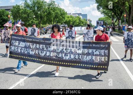 Washington DC,National Memorial Day Parade,staging area youth Black Hispanic volunteers banner photos Tuskegee Airmen,World War II WWII, Stock Photo