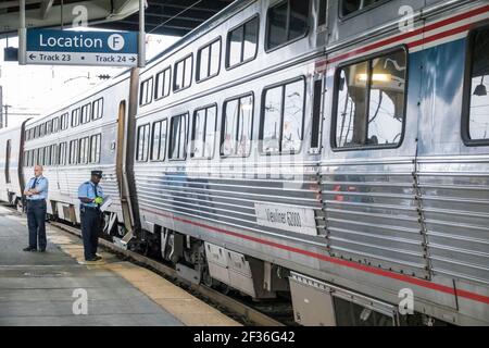 Washington DC,Union Station,railroad train terminal Amtrak Silver Meteor Star,Viewliner sleeping car,platform conductor crew member, Stock Photo