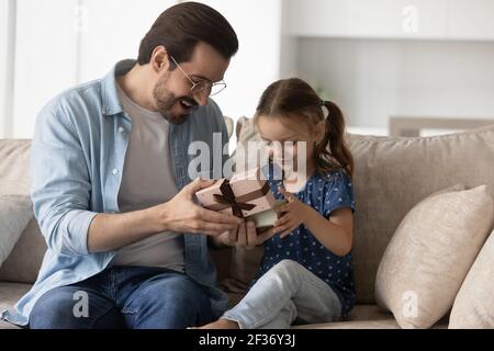 Caring father congratulate small daughter with birthday Stock Photo