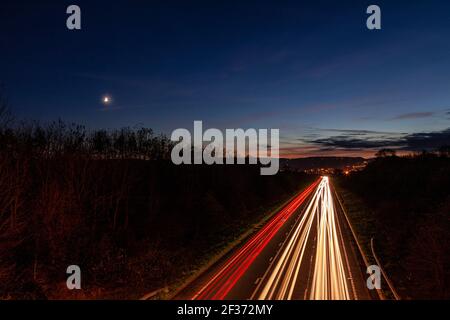 Traffic trails at dusk, North Wales Stock Photo